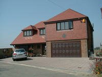 Smaller Plot Timber Frame Home with double garage